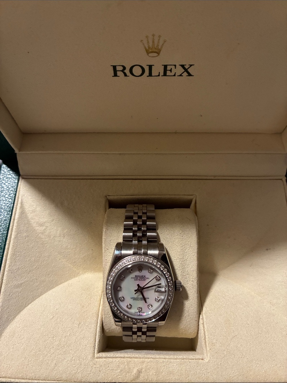 Rolex Ladies Diamond Bezel Watch — Silver with White Dial